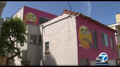 The enormous apple Seaside home painted incandescent red with enormous emojis after neighbors file owner | ABC7